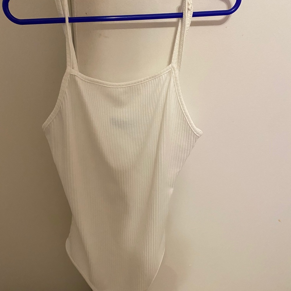 Never worn white bodysuit